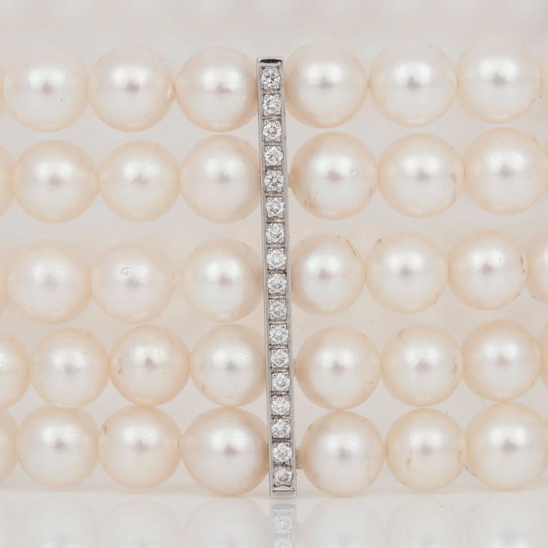 A cultured pearl and diamond necklace, "collier de chien", with 5 strands of pearls, Ø 5.9 mm.