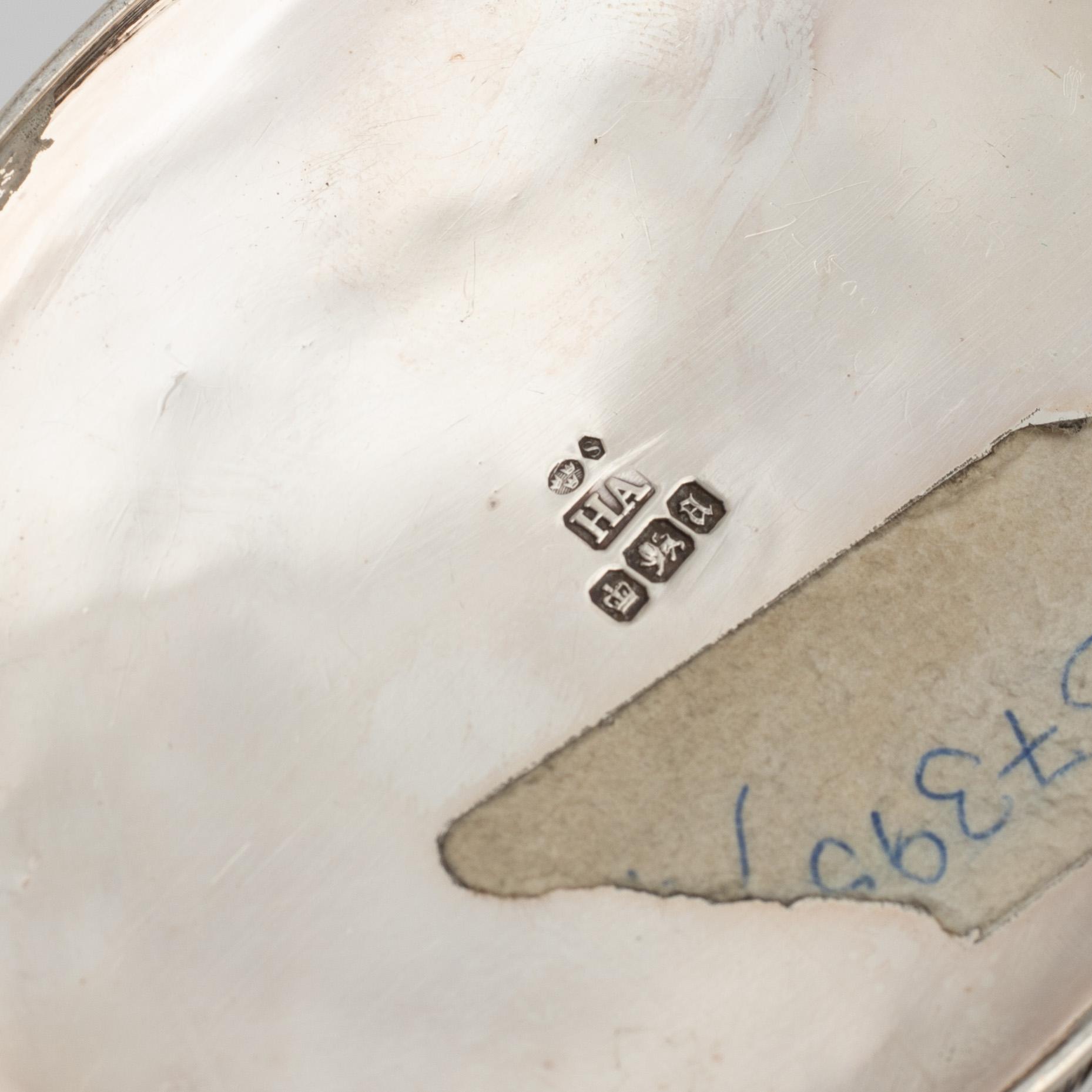 A four containers, partly silver, 20th Century.