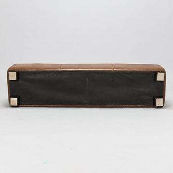 A leather-upholstered bench from Industria Divani e Poltrone, Italy.