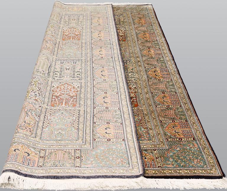 A silk Kashmir carpet, 295 x 178 cm.