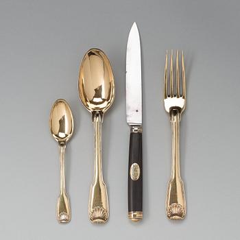 A five piece set of silver-gilt travel-cutlery, unidentifiable makers mark, Paris 1798-1809, in original box.