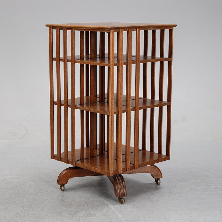 An oak revolving book case, early 20th Century.