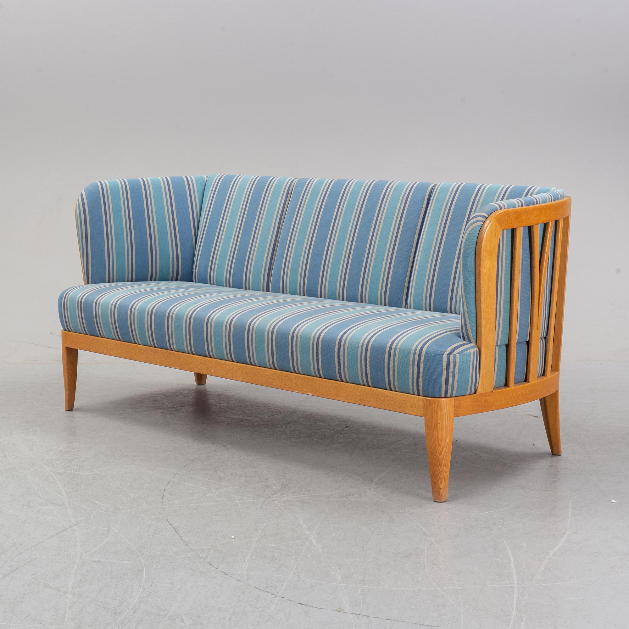 An 'Ulla' oak sofa by Carl Malmsten, 1964.