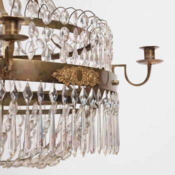 A late Gustavian gilt brass and cut glass seven-light chandelier, circa 1800.