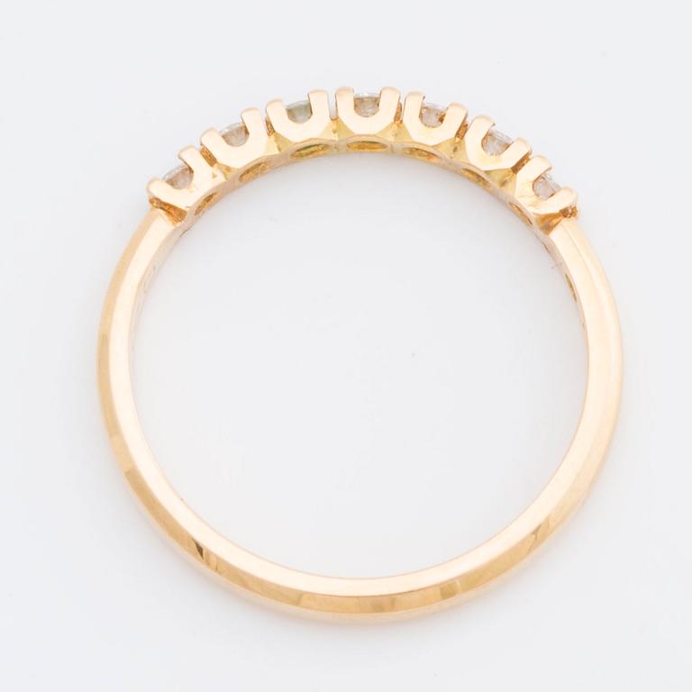 RING 18K gold w 7 brilliant-cut diamonds 0,21 ct engraved. Strömdahl Stockholm 1985.