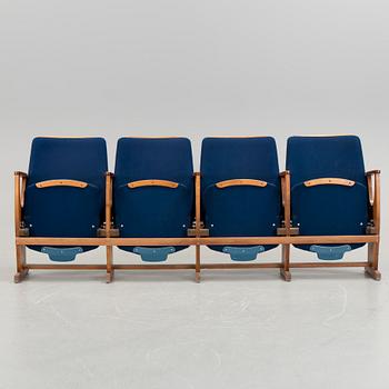 A four seated cinema sofa, mid 20th century.