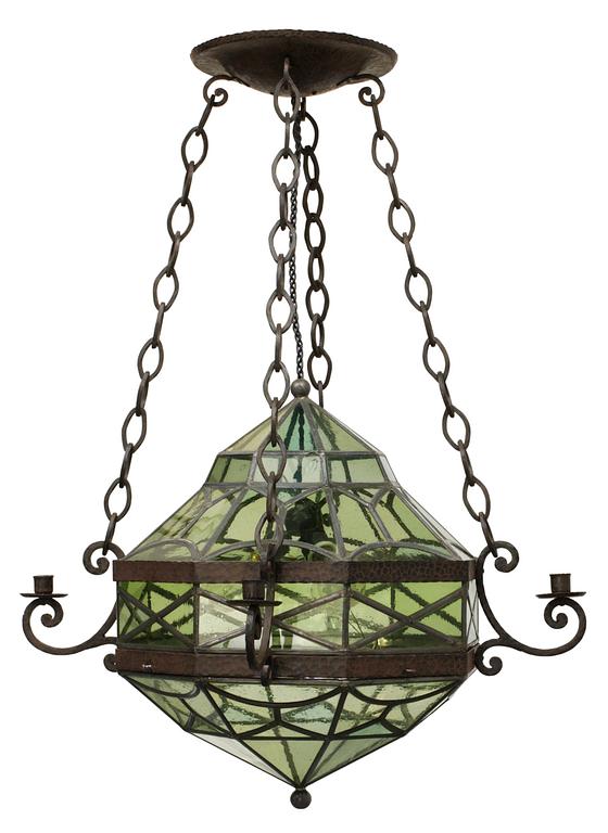 AN ART NOVEAU hammered iron hanging lamp with leaded glass panes, Sweden ca 1910.