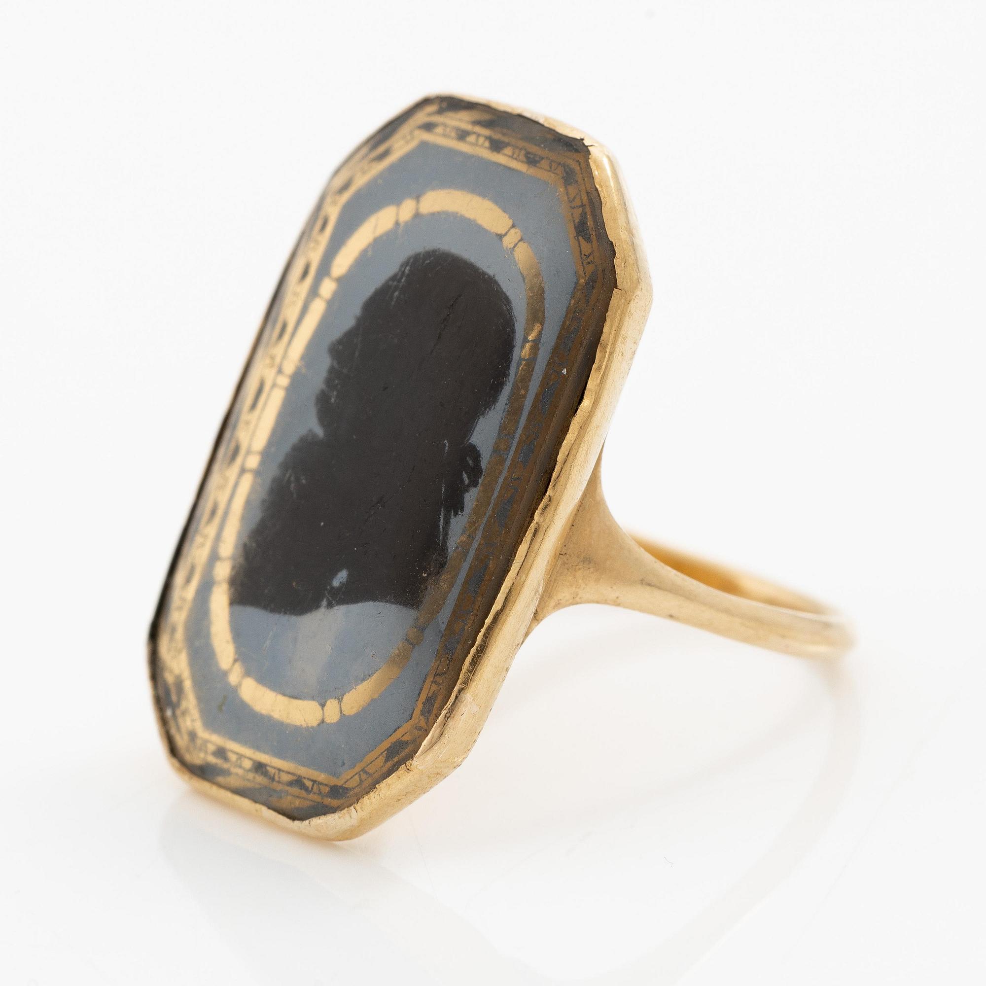 A silhouette ring, 18K gold with enamel, Friedrich Silber, Karlskrona 1796.