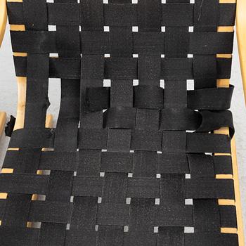 Alvar Aalto, a pair of model 406 armchairs, Artek, end of the 20th century.