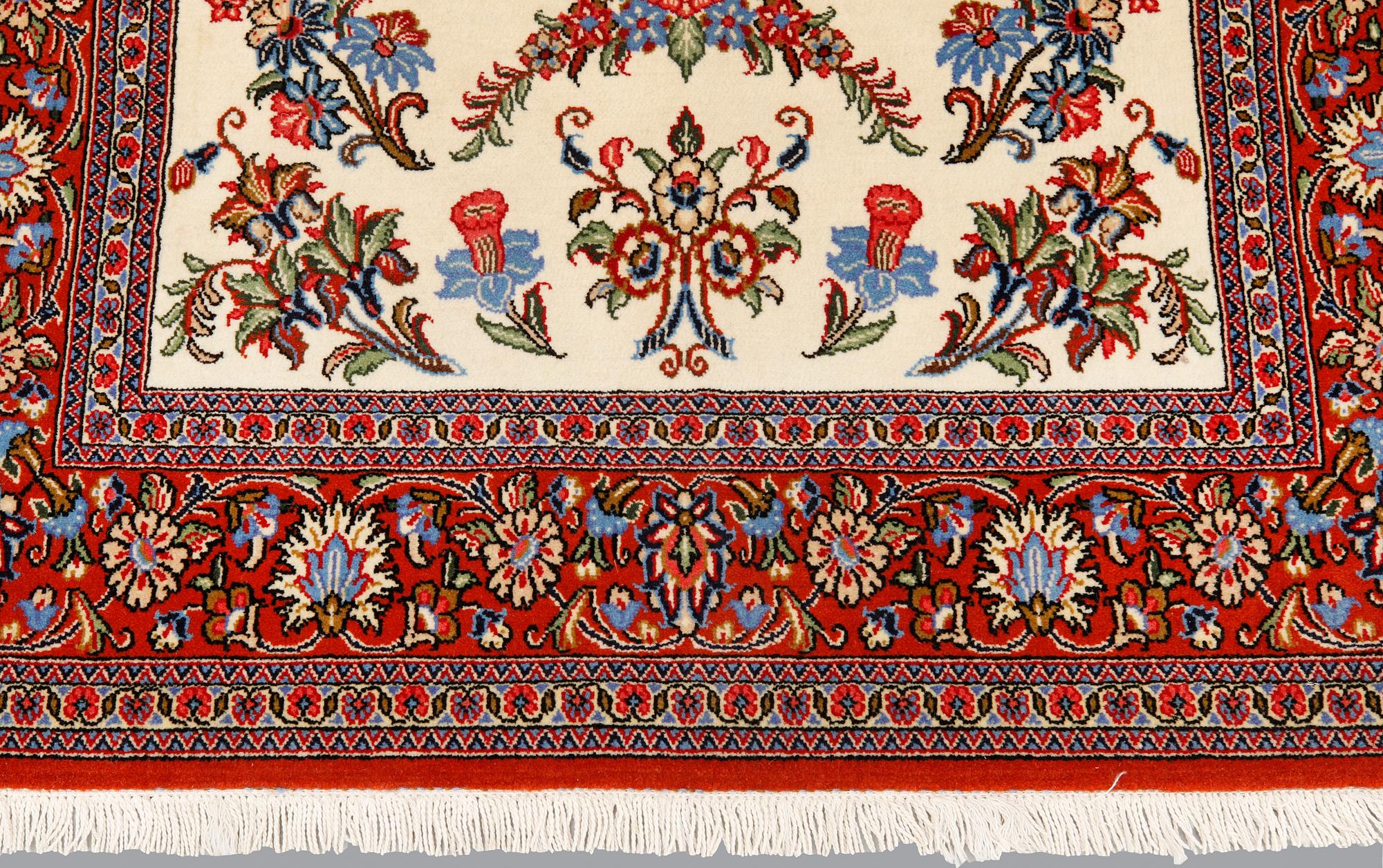 A Ghom rug, ca 155 x 105 cm.