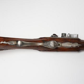 A flintlock gun by Jakob Nusbaum Stockholm, (1731-1784).