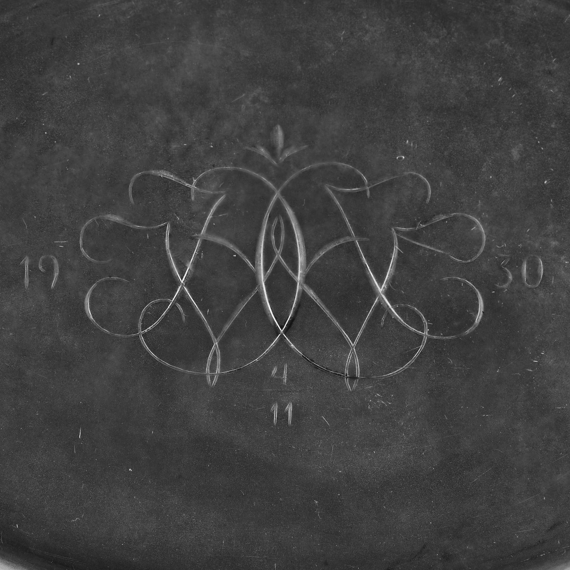Simon Gate, a Swedish Grace engraved glass bowl with stand, Orrefors 1930, model 147, engraved by Karl Rössler.
