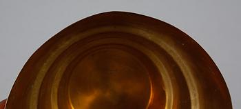 VINKYLARE PÅ BENSTÄLLNING, mässing, 1900-talets fjärde kvartal.