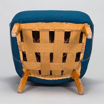 Flemming Lassen, an armchair manufactured by Asko 1952-1956.