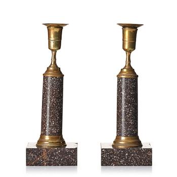 149. A pair of late Gustavian gilt-brass and 'Blyberg' porphyry candlesticks, Stockholm, circa 1800.