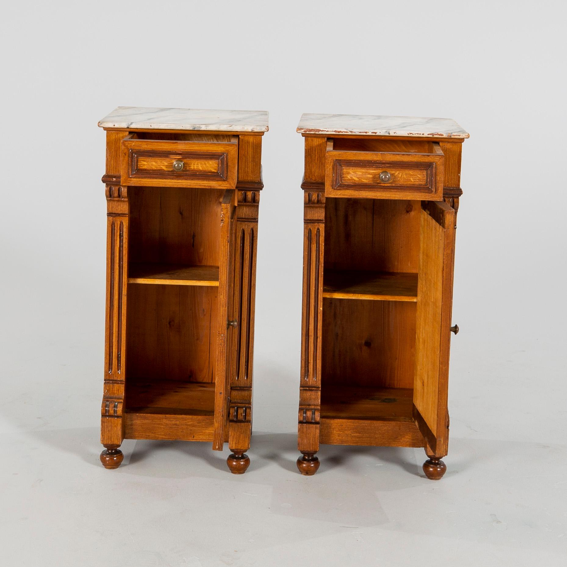 A pair of Neo Renaissance  bedside tables.