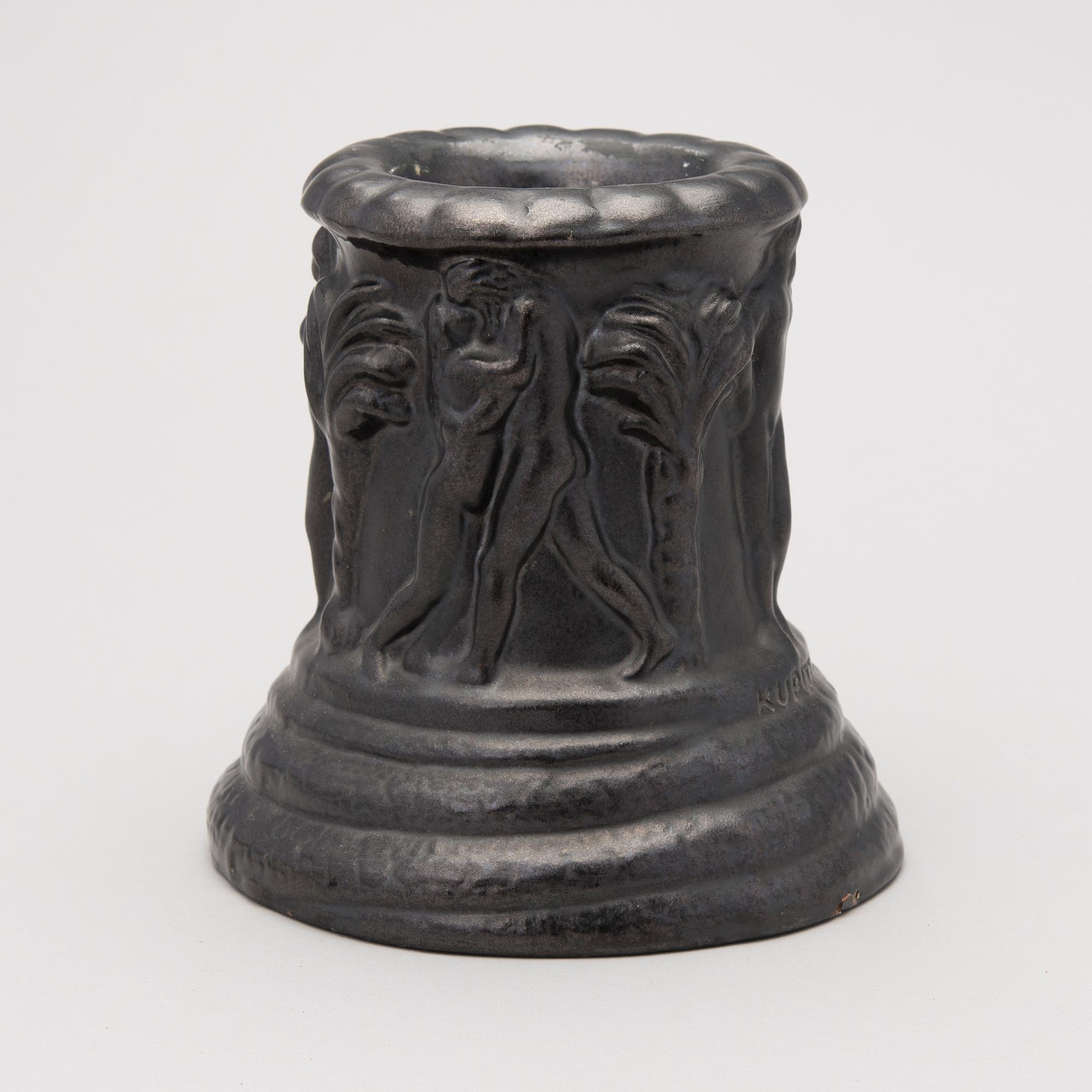 a plaster decoration bowl, signed Aarre Aaltonen 1923.