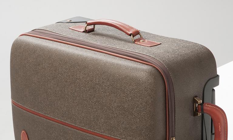 A hardsided trolley by Mulberry.