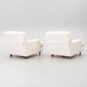 Vico Magistretti, a pair of 'Raffles' armchairs, De Padova, Italy, 21st century.