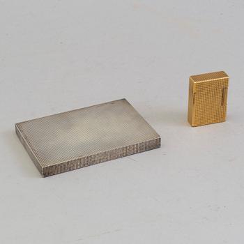 A parcel-gilt silver Dunhill cigarette case and a gold plated Dupont lighter from Paris.