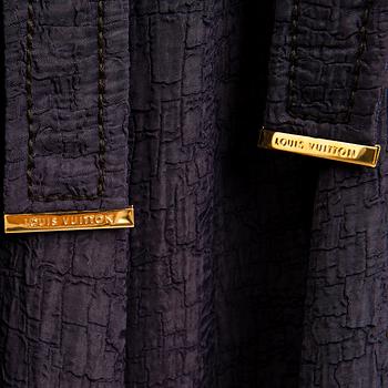 KLÄNNING, Louis Vuitton.