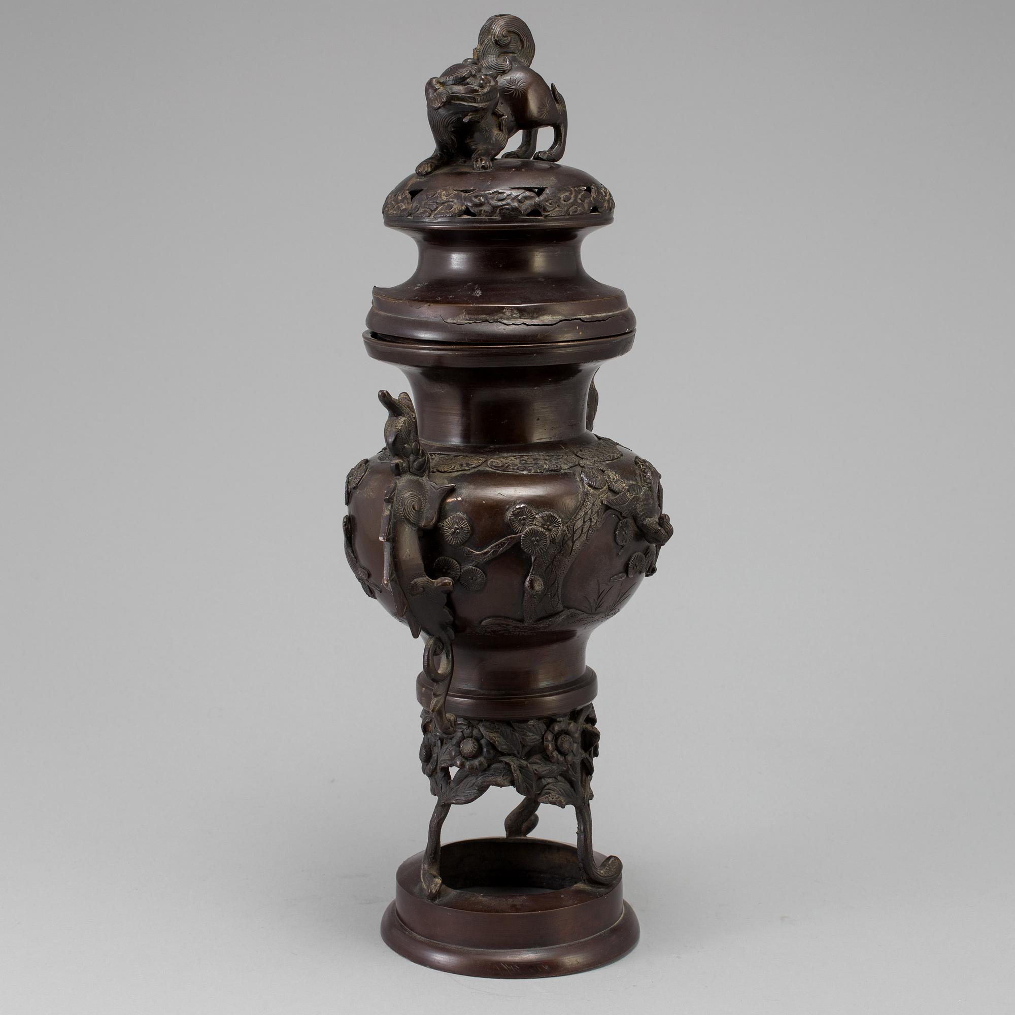 A Japanese bronze vase and cover, Meiji, late 19th century.