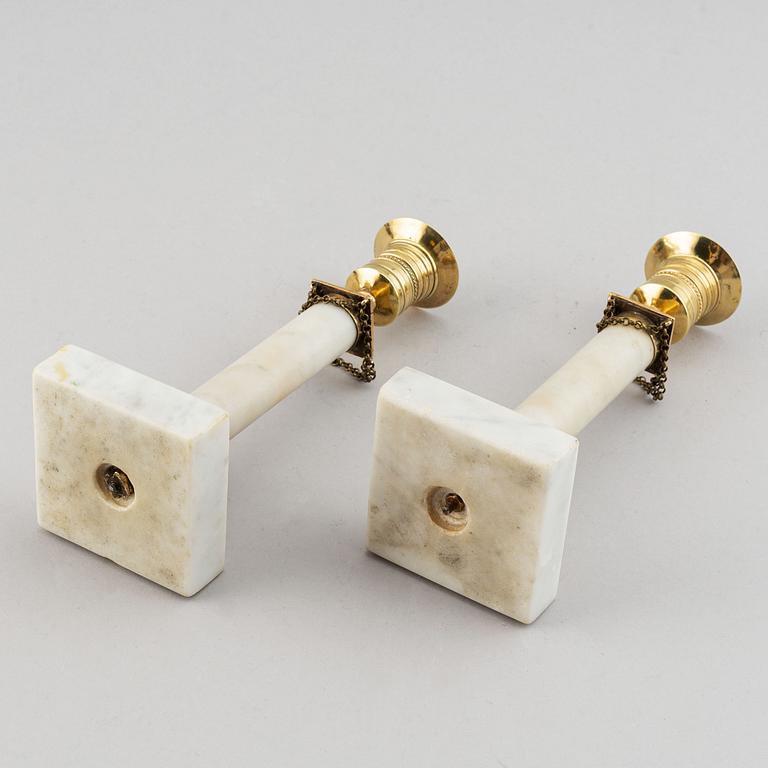 A pair of late-gustavian candlesticks, around year 1800.
