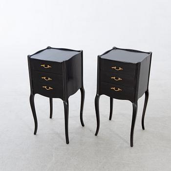 A pair of Rococo-style bedside tables later part of the 20th century.