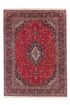 An old Keshan carpet ca 410 x 295 cm.