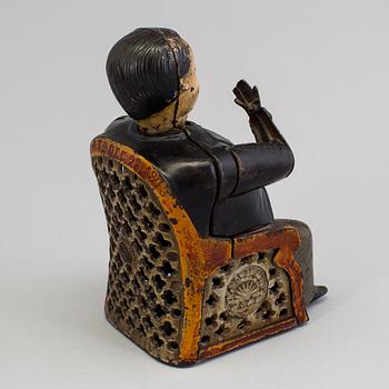 A Moneybox, cast iron, late 19th century.