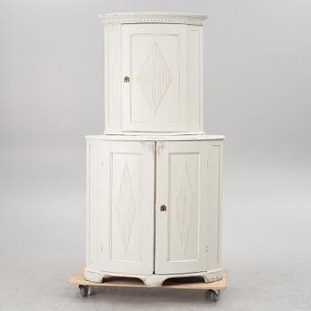 A two-part corner cabinet, 19th century.