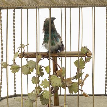 A music box in the shape of a bird's cage, France, late 19th century.