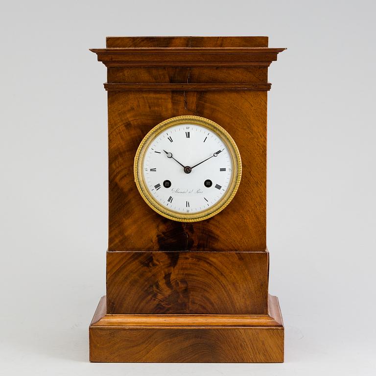A French Empire mahogany mantle clock by Alexandre à Paris, first half of the 19th Century.