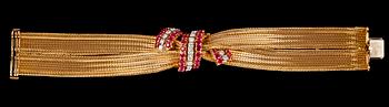 A gold, ruby and diamond bracelet, 1950's.