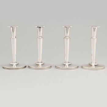 a set of four silver candlesticks by Ceson Gothenburg 1985-1987.