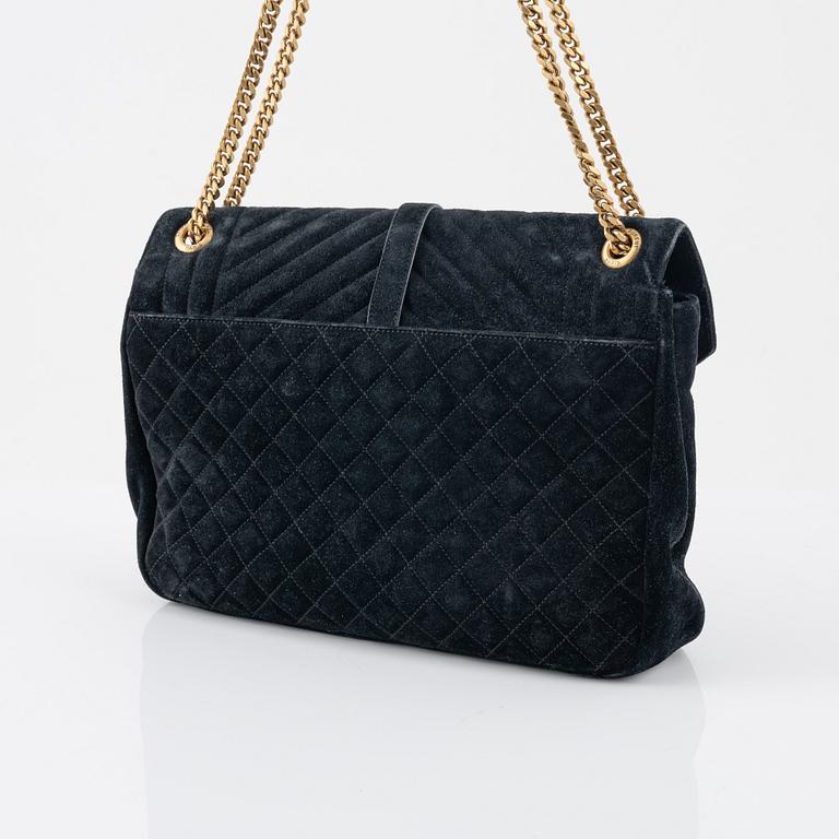 Yves Saint Laurent, a black suede 'Soft envelope bag'.