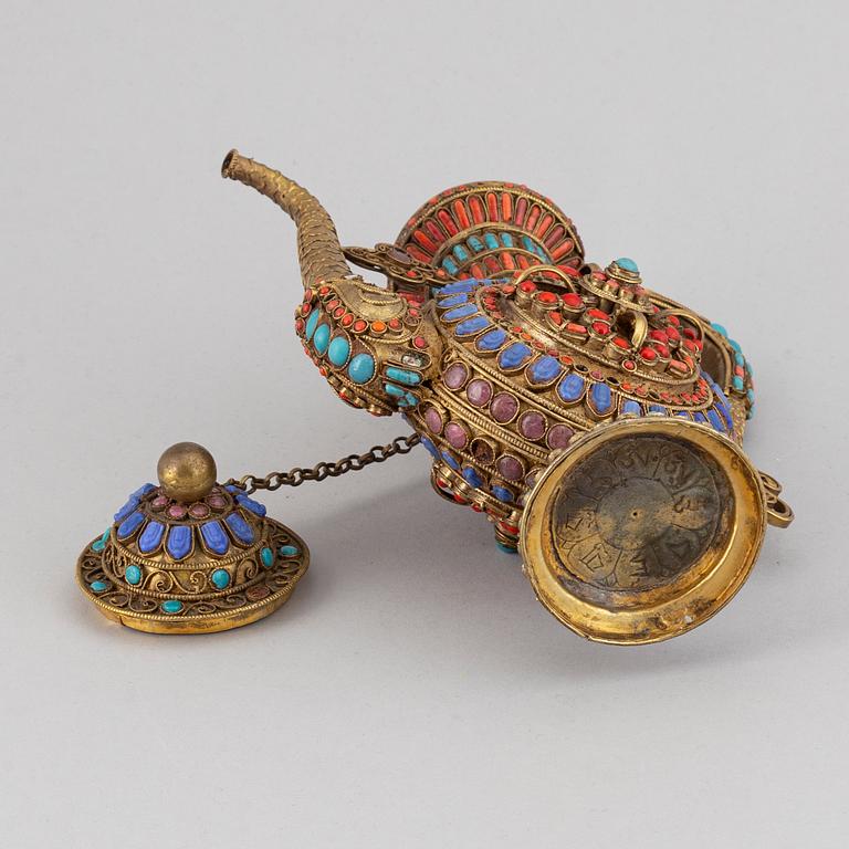 A Tibetan metal and stone inlay pot, 20th century.
