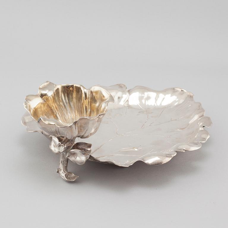 A silvered metal serving dish, early 20th century.