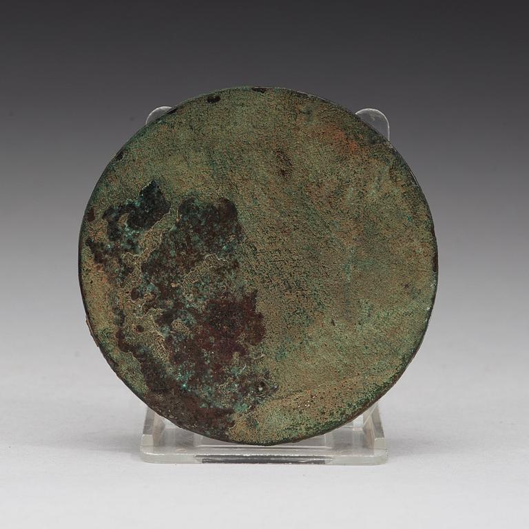 SPEGEL, brons. Troligen Tangdynastin (618-907).