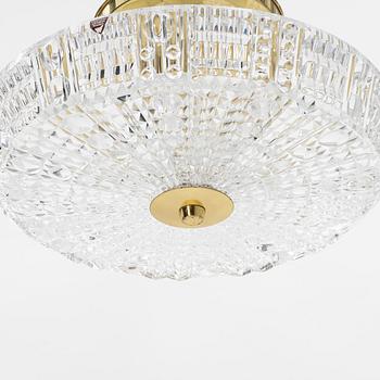 Carl Fagerlund, a glass and brass ceiling lamp, Orrefors, second half of the 20th century.