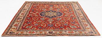 A oriental carpet, ca 320 x 223 cm.
