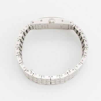 A Cartier "Tank Américane" 18K white gold watch set with round brilliant-cut diamonds.