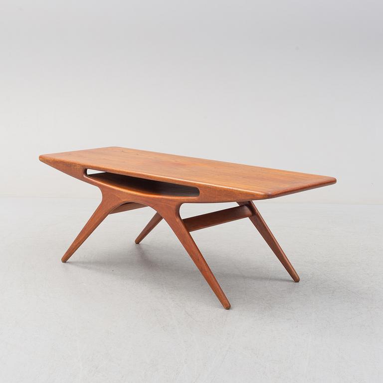 A 1950s teak veneered 'Smile' coffee table by Johannes Andersen for CFC Silkeborg, Denmark.