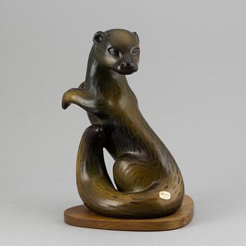 GUNNAR NYLUND, a stoneware sculpture of an otter, Rörstrand, Sweden.