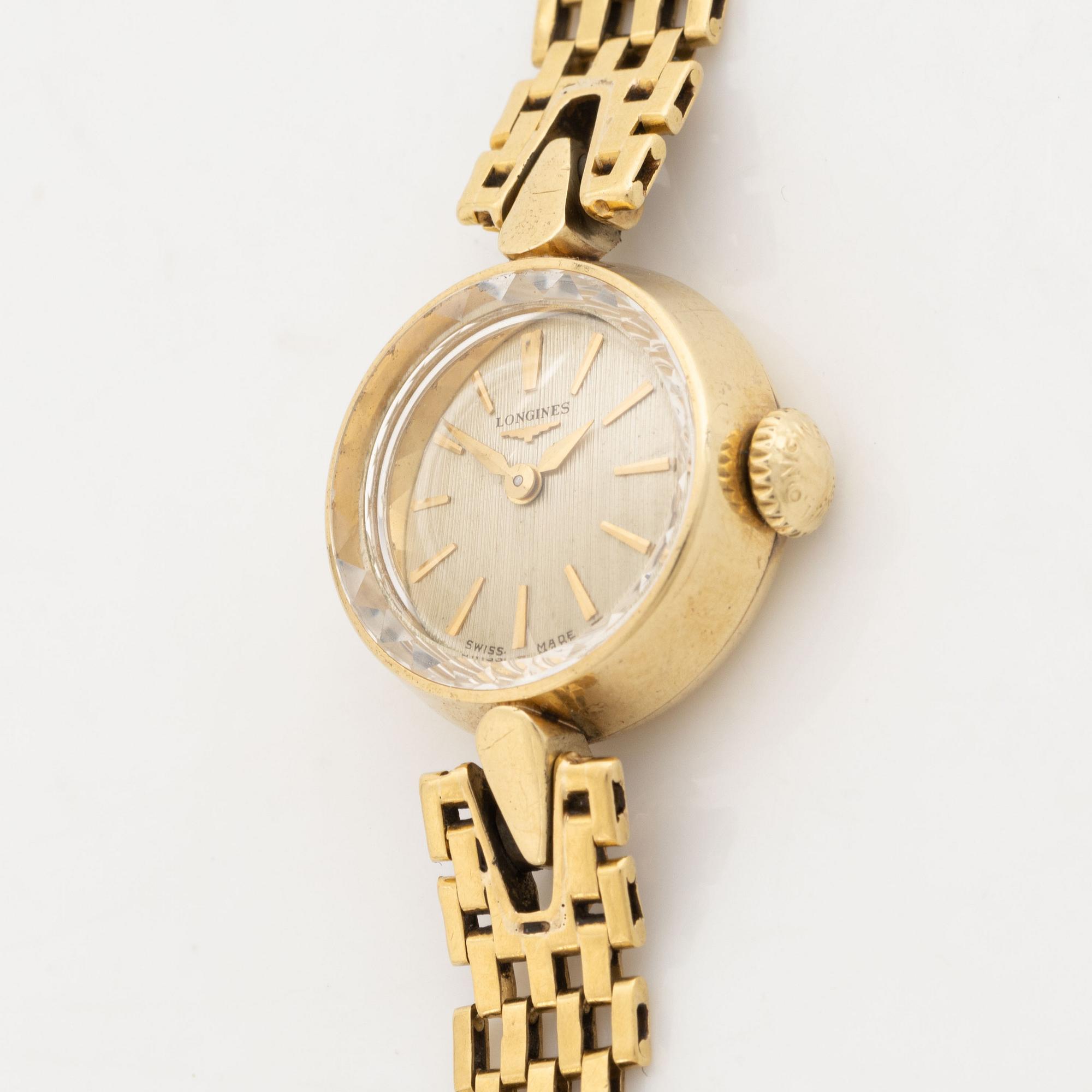 18K and 14K gold Longines ladies watch.