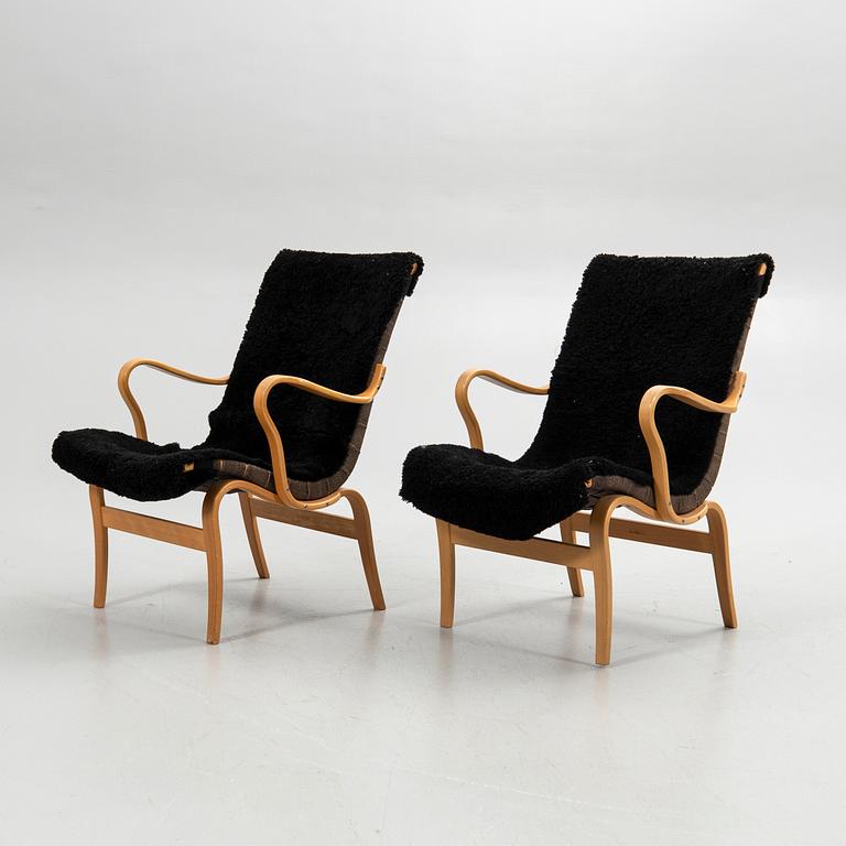 Bruno Mathsson, armchairs, a pair, "Eva", Bruno Mathsson International, Värnamo, second half of the 20th century.