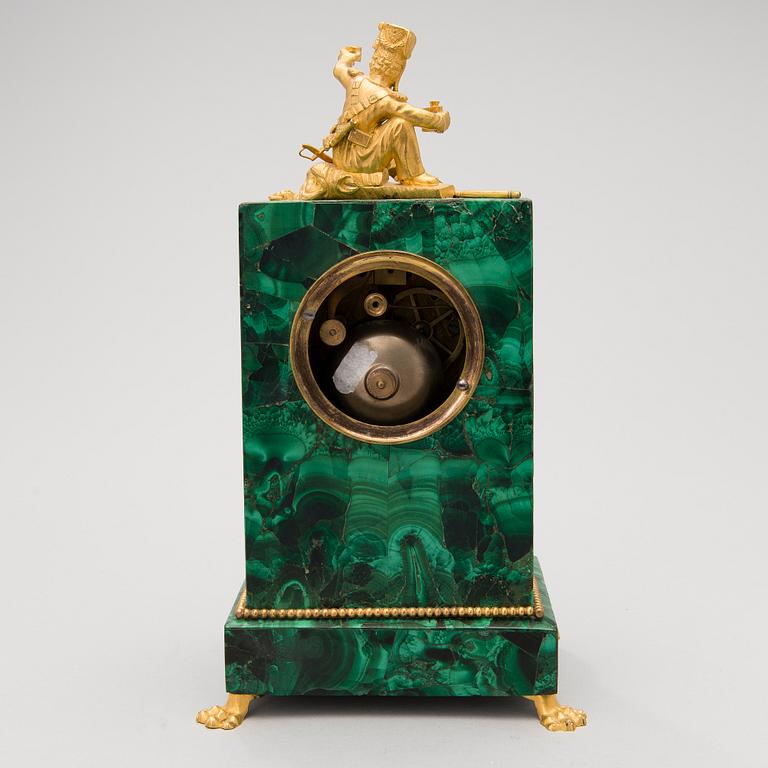 A mid 19th Century French gilt bronze and malachite mantel clock.