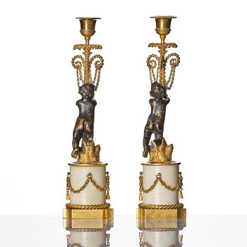 A pair of presumably German Louis XVI candlesticks, circa 1800.