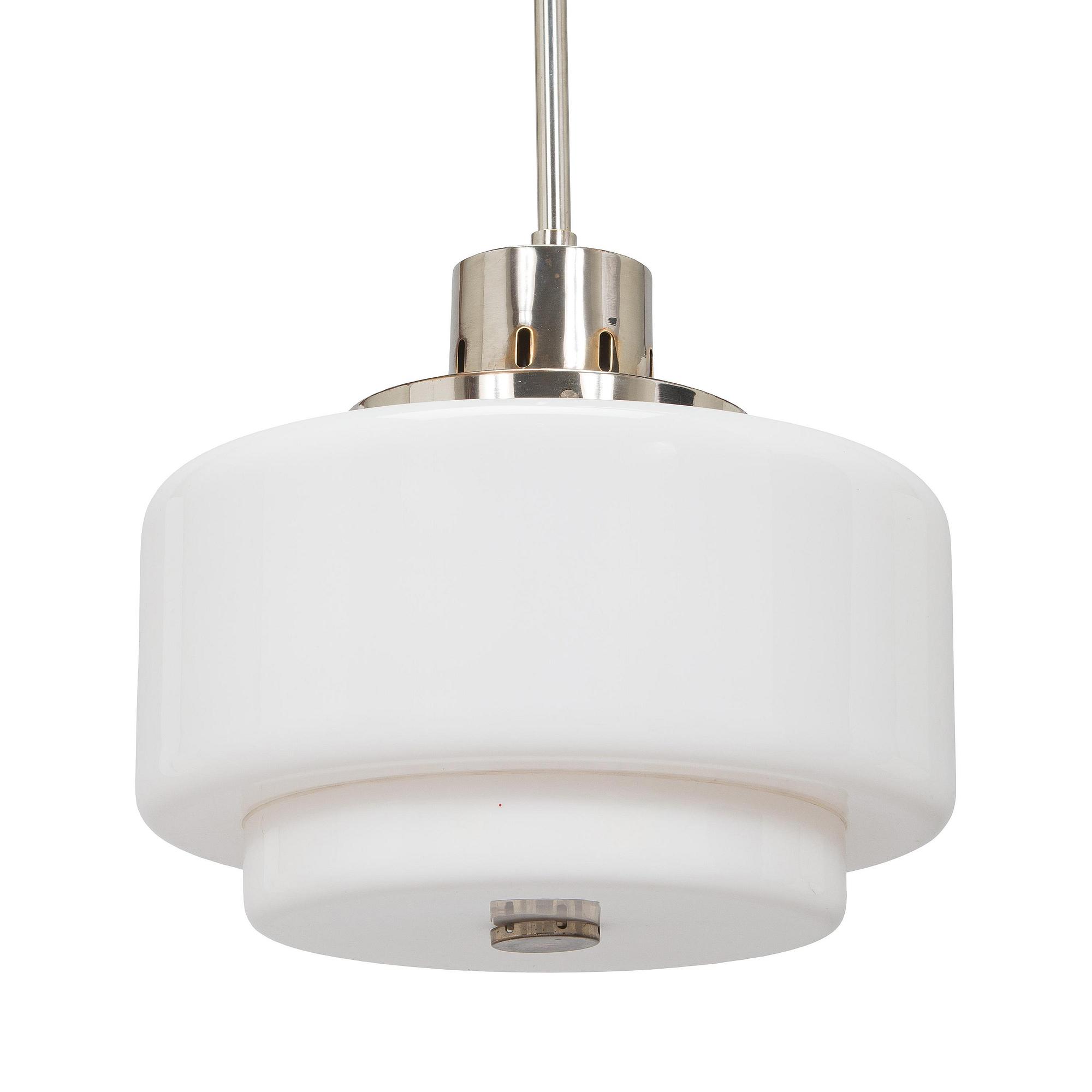 Paavo Tynell, kattovalaisin, malli 2004, Taito 1930-luku.