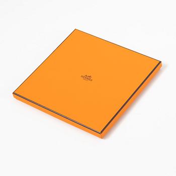 Hermès, a 'Persona' twill silk scarf.